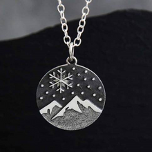 Load image into Gallery viewer, Sterling silver mountain and snowflake necklace
